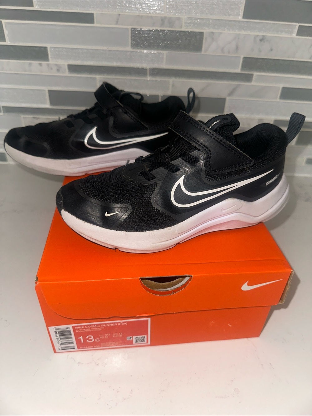 Black Nike Cosmic Runner Children’s size 13c sneaker
